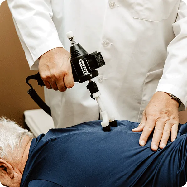Hands-on soft tissue therapy on a patient’s back