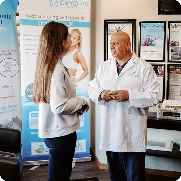 Dr. Tony talking a patient through her results