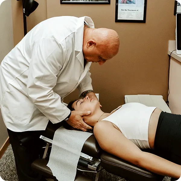 A chiropractic adjustment in progress
