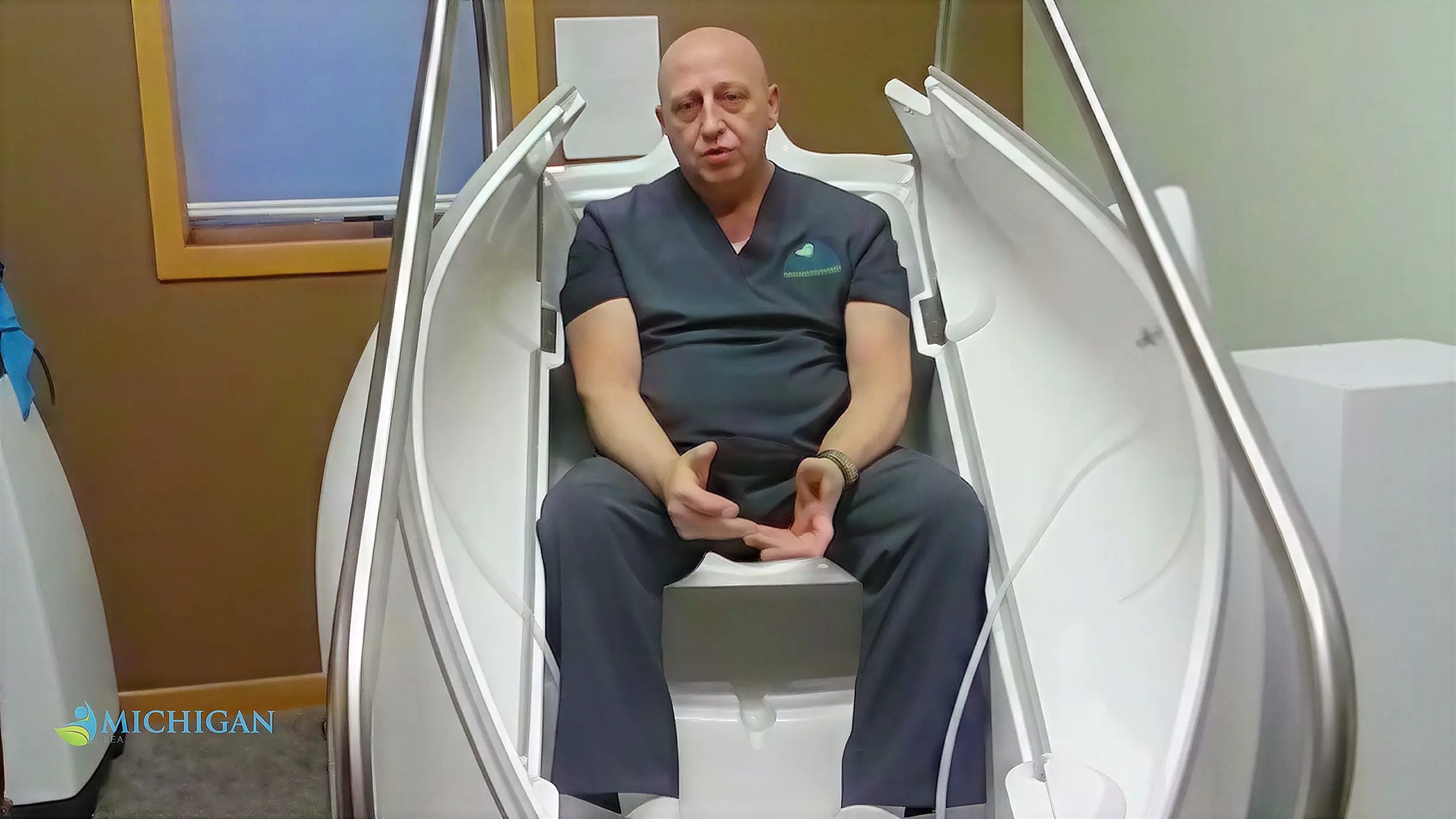 Dr. Tony beside the HOCATT therapy chamber